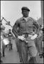 Photograph: [Uniformed Band Leader Marching in Armed Forces Day Parade]