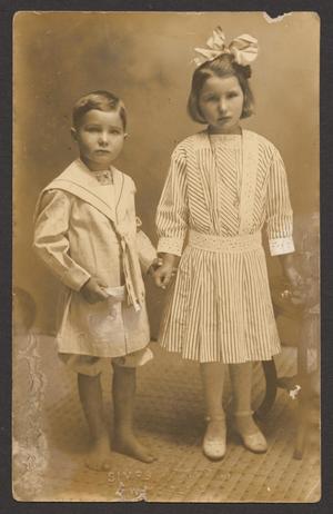 Primary view of object titled '[Photograph of J. W. Terrill and a Young Girl]'.