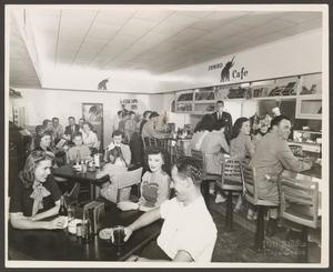 [Photograph of Patrons Inside Jumbo Cafe]