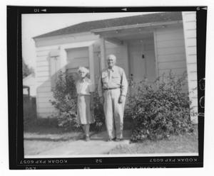 [John and Jennie Blankenship in Front of a House]