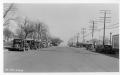 Photograph: [Photograph of Cars Lining Street]