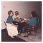 Photograph: [Photograph of Employees in the Cafeteria]