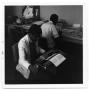 Photograph: [Students Working on Echo Yearbook]