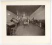 Photograph: [View inside a business, perhaps a typesetters.]