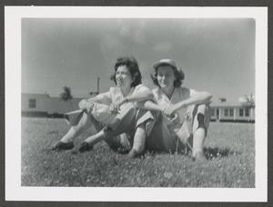 [Two WASP Trainees sitting on Grass]