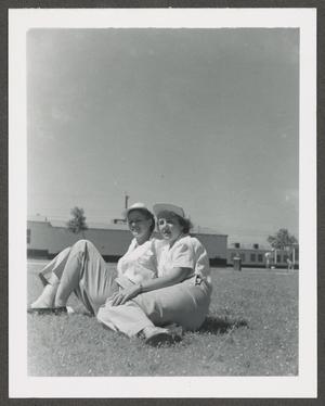 [Two WASP Trainees sitting on Grass]