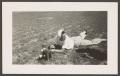 Thumbnail image of item number 1 in: '[Woman on Ground with Camera]'.