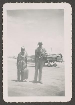 Primary view of object titled '[Herman Fuchs with Student Pilot on Tarmac]'.