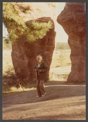 [Woman by Large Rocks]