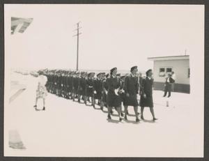 Primary view of object titled '[Class 44-W-7 Marching at Graduation]'.