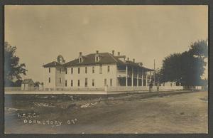 Primary view of object titled '[Postcard of a Building With a Large Balcony]'.