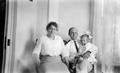 Photograph: [Man, Woman, and Child Sit for a Photo #2]