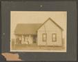 Photograph: [House with People on the Porch]