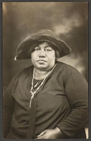 Primary view of object titled '[Postcard of a Woman Wearing a Hat]'.