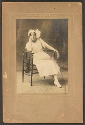 Primary view of object titled '[Photograph of Young Woman Wearing Headband with Bow]'.