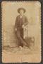 Photograph: [Photograph of Man Wearing Pinstripe Suit]