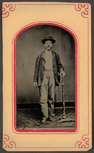 [Photograph of Man with Cane]