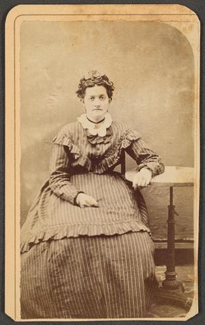 [Photograph of Woman in Striped Dress]