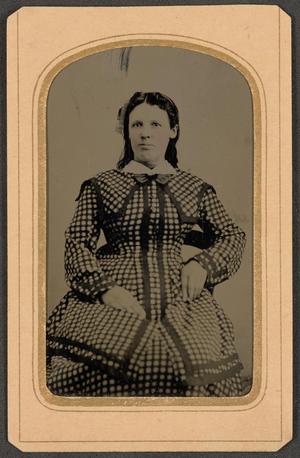 Primary view of object titled '[Photograph of Woman Wearing a Checked Dress]'.
