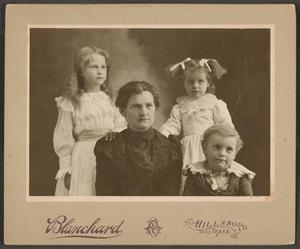 [Photograph of Woman and Three Children]