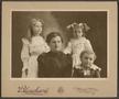 Photograph: [Photograph of Woman and Three Children]