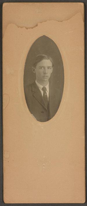 [Photograph of Man Wearing a Tie with Pin]