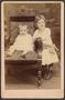 Photograph: [Photograph of Baby and Young Girl]
