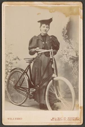 Primary view of object titled '[Photograph of Woman With a Bicycle]'.