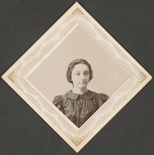 [Photograph of Woman Wearing Collared Dress]