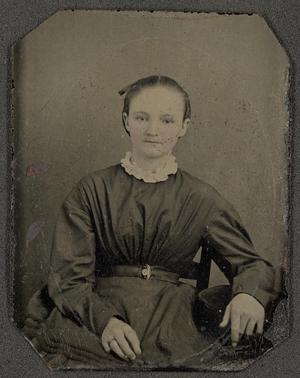 [Photograph of Woman Wearing Belted Dress]