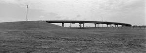Primary view of object titled 'Overpass ramp from Interstate 35 East toward Interstate 35 West in Denton, Texas'.