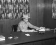 Thumbnail image of item number 1 in: '[James McCarty at Desk]'.