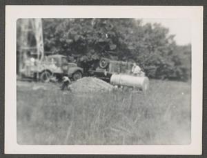 [Truck and Equipment in Field]