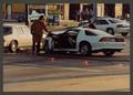Primary view of [Damaged Sports Car in an Intersection]