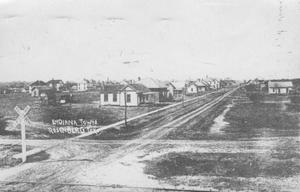 [Indiana Town in Rosenberg, railroad crossing on the left.]