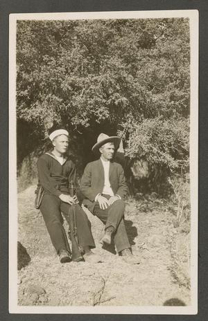 [Two Men Seated on a Rock]