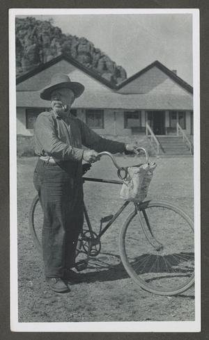 [Nick Mersefelder Standing with a Bicycle]