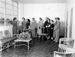 Primary view of object titled 'Opening of Lee College- Group in teacher's lounge'.