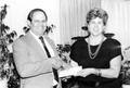 Photograph: Keith Trainer, left, of Brown & Root present a $2000 Halliburton gran…