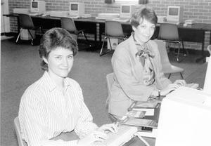 Primary view of object titled 'English instructors Lynda Williams, left and Roberta Wright, try out new software for the Lee College Writing Center'.
