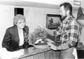Photograph: Horticulture instructor Tom Harmon shows a bonsai to Pat Thomas of th…