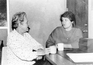 Alma Haddick member of Friends of Lee College has coffee with student coordinator Patti DeHart in the returning students office.
