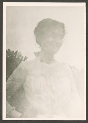Primary view of object titled '[Photograph of Fern Munson Standing Outdoors]'.