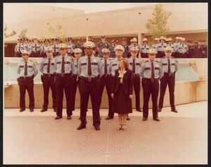Primary view of object titled '[Photograph of Lee Brown and Kathy Whitmire with the Houston Police Force]'.