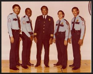 [Photograph of Lee Brown with Black Police Officers]