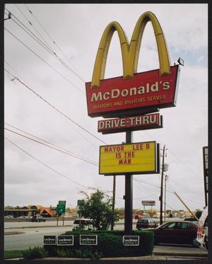 Primary view of object titled '[Photograph of a McDonald's Sign Reading "Mayor Lee B Is the Man."]'.