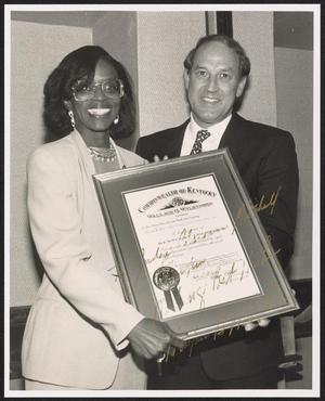 [Photograph of Clarease Rankin Yates Holding a Certificate]