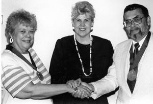 Vivian Blevins, center, with excellence in teaching awards recipients Muriel Tyssen and John Britt.
