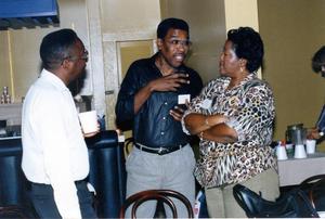 Taking a break during Black Educational Access Committee activities are from left, Randal Williams and Roosevelt and Joyce Campbell
