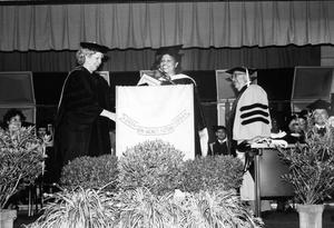 [President Vivian Blevins presents Rep. Wilhelmina Delco with an honorary degree]